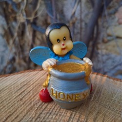 Figurine abeille et pot de...
